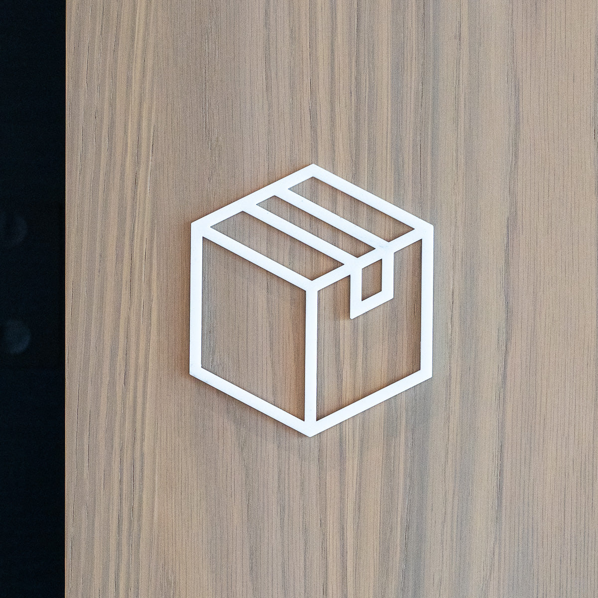 Pictogramme Colis blanc, vue rapprochée