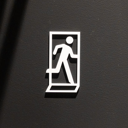 Pictogramme Sortie de secours blanc, vue rapprochée
