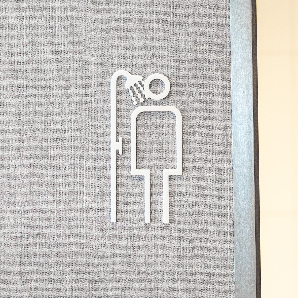 Pictogramme Douche homme blanc, vue rapprochée