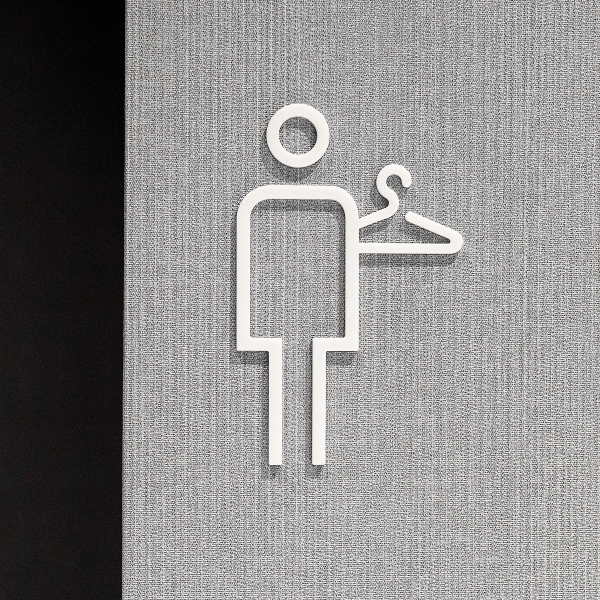 Pictogramme Vestiaire homme blanc, vue rapprochée